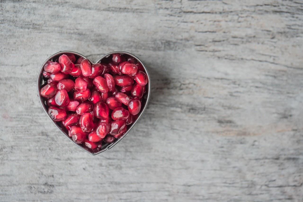 heart with pomegranate seeds