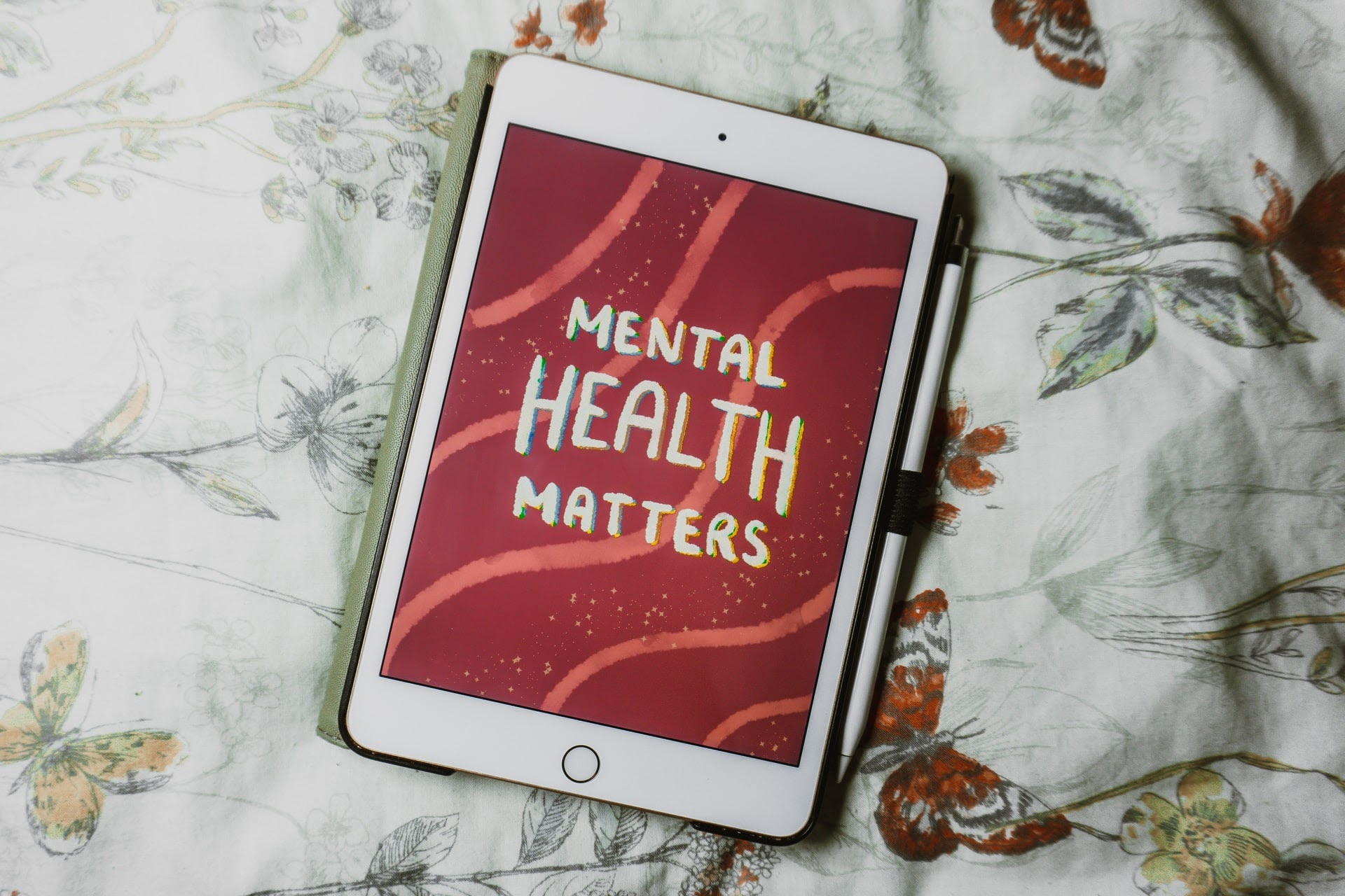 iPad with a hand drawn "mental health matters" graphic.