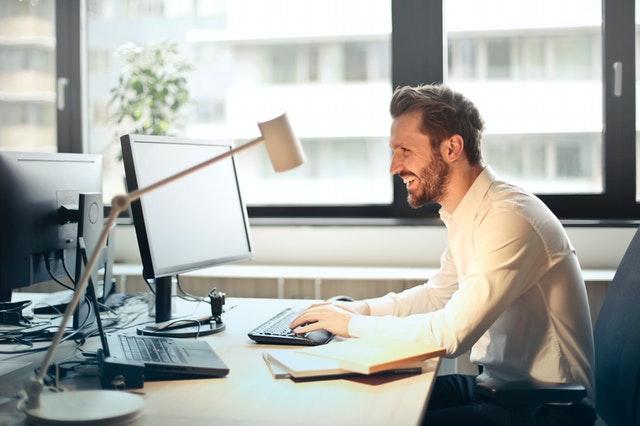 man working on computer