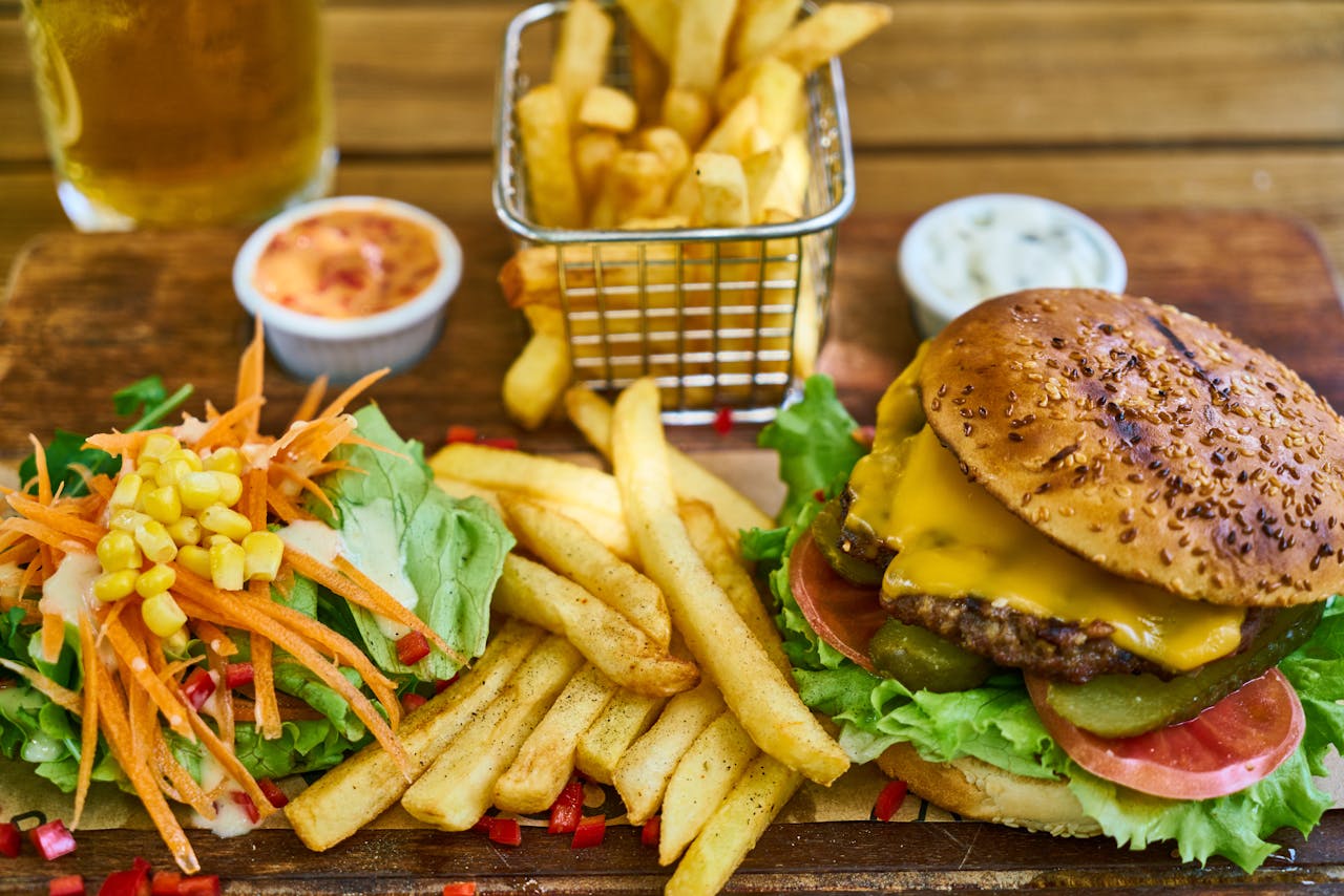 fastfood burger, fries and salad