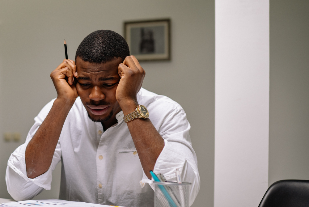 man stressed about work