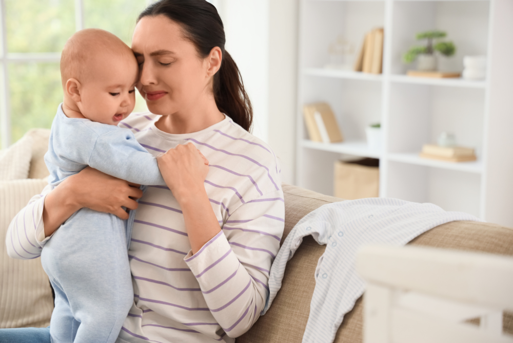 new mom holding baby